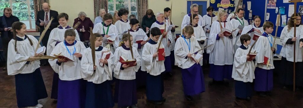 The choir and congregation gathering for the Palm Sunday procession